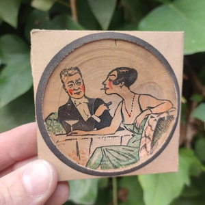 Juego Girame Pareja en restaurante. Años 20. Vintage