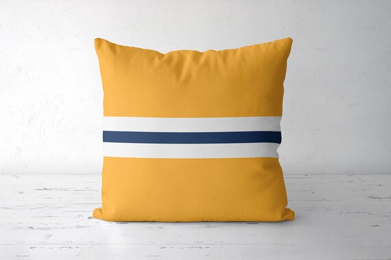 navy blue and yellow throw pillows