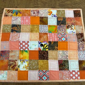 Stoff-Geschirrtuchmatte in Orange-Lachs-Tönen