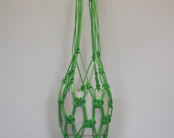 Green macrame plant hanger. Hanging planter. Hanging flowerpot holder.