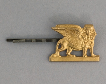Vintage stamped brass winged lion sphinx in Egyptian revival style hair pin. ac-h-232