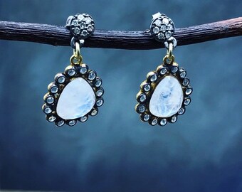 Diamonds moonstones and topaz earrings