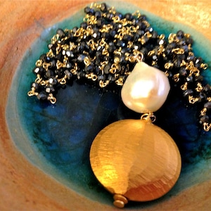 Long Black Spinel necklace/Lariat with Baroque pearl and rustic mat 24K over silver disc. Matana jewelry, gift idea