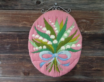 Swedish vintage wall hanging oval embroidery featuring lilies of the valley W10"x H13" with metal hanger