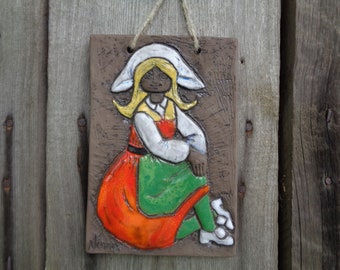 Swedish Vintage Pottery Atelje Ninnie Keramik Wall Plaque Relief Tile featuring Girl in Folk Costume; Vintage Studio Pottery Wall Hanging
