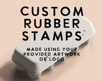 May include: White cardboard egg carton with the text "CUSTOM RUBBER STAMPS MADE USING YOUR PROVIDED ARTWORK OR LOGO" printed on it.