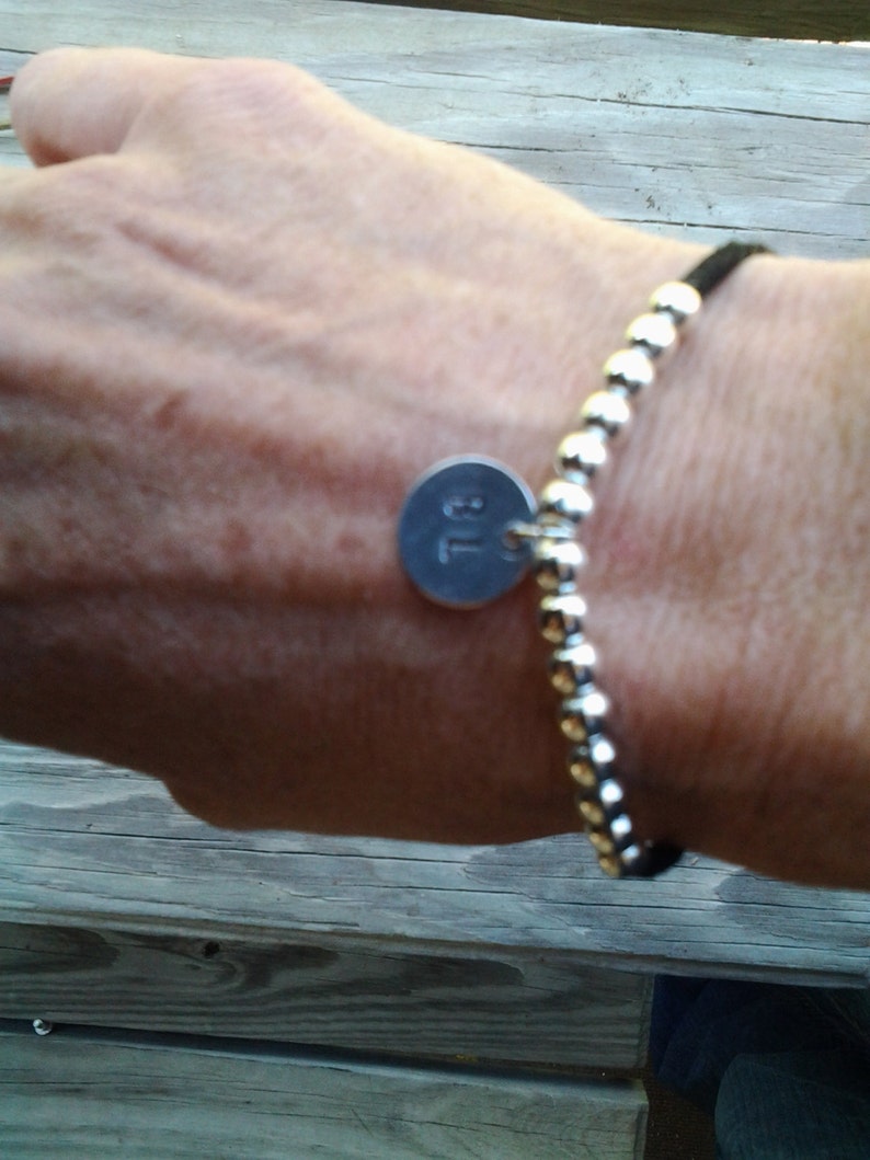 Leather cord with 14 silver metal beads. | Etsy