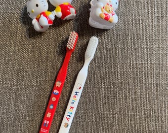 2 Vintage Sanrio Hello Kitty Toothbrushes with Travel Cases