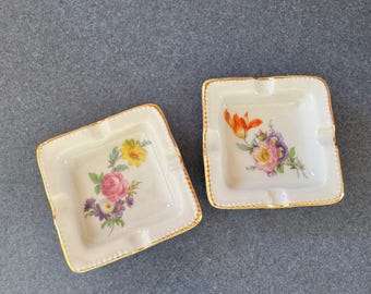Vintage pair of boudoir floral print ashtrays