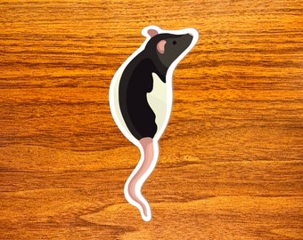 May include: A black and white rat sticker with a long tail. The rat is standing on its hind legs with its front paws raised.
