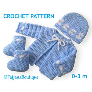May include: Crochet pattern for a baby set in light blue with white accents. The set includes a hat, booties, and a cardigan. The pattern is for sizes 0-3 months.