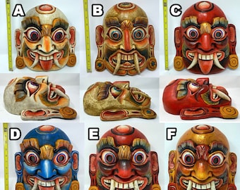 タルー族のシャーマンの悪魔払いのマスク、手彫りのネパールの儀式用