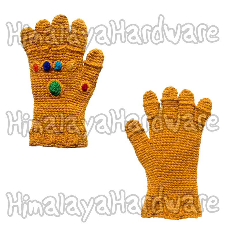 May include: A pair of crocheted gloves, one with a design resembling the Infinity Gauntlet from the Marvel Cinematic Universe. The gauntlet glove features colorful gems in the palm. Both gloves are a light yellow color.