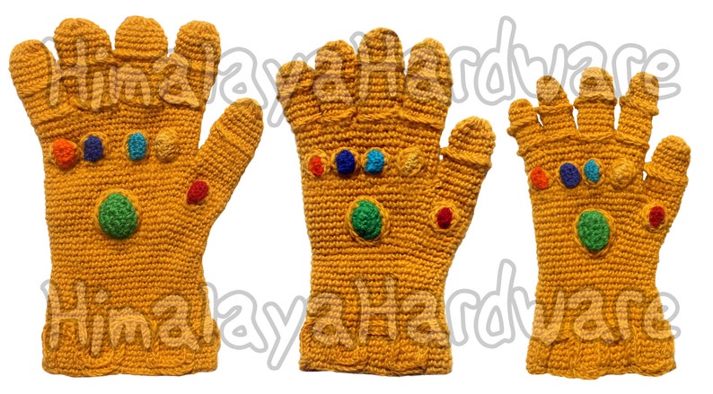 May include: Three crocheted Infinity Gauntlet gloves in yellow with colorful gems. The gloves are made with a textured yarn and have a detailed design.