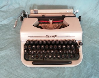 Vintage 1960s SwissaJunior Manual Typewriter - works great - safe shipping