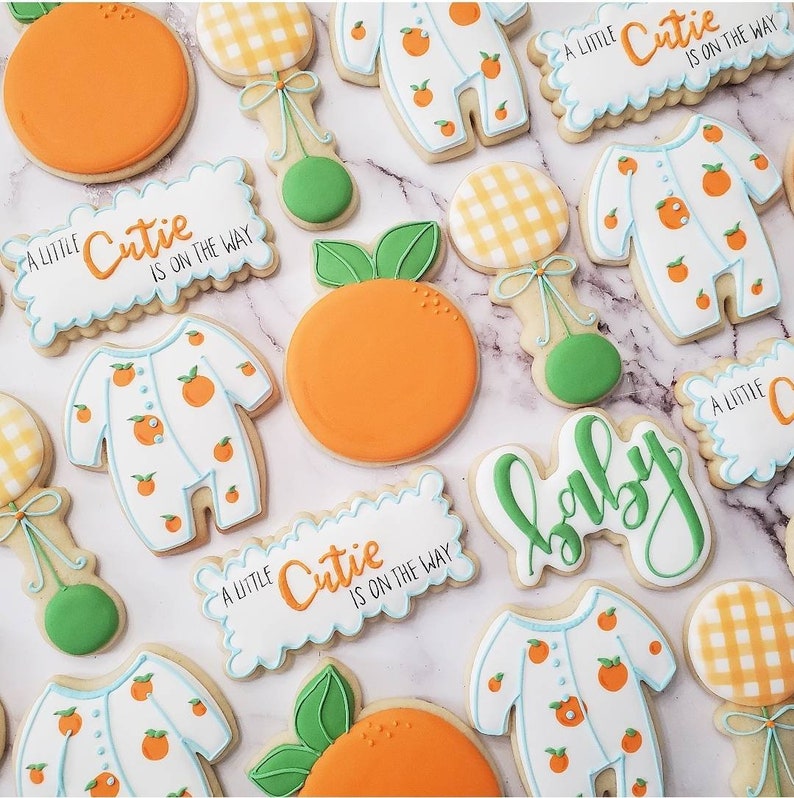 custom cookies Little Cutie baby shower food ideas. Check out this list of Little Cutie baby shower ideas. Includes ideas for favors, food, decorations and more.
