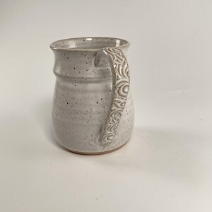 A Speckled White Extra Large Mug showing the textured handle