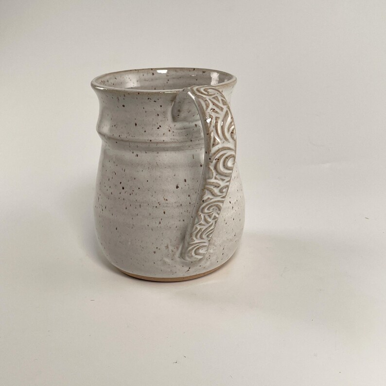 A Speckled White Extra Large Mug showing the textured handle