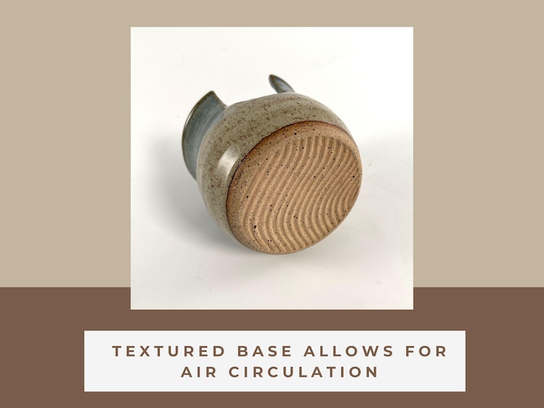 A piece of pottery with wiggle wire cut marks across the bottom to show that the texture marks allows for air circulation.