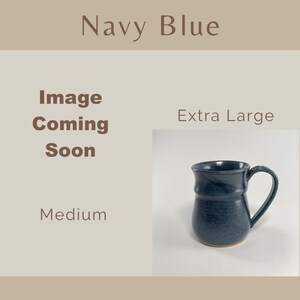 Showing places for two Navy Blue Banded Belly Mugs, one sized Medium and the other sized Extra Large. The Medium is labeled Image coming soon The Extra Large is showing.