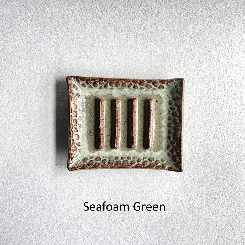 A Seafoam Green Soap Dish.