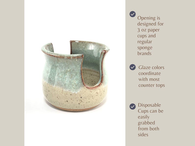 Showing a Seafoam Green Cup Dispenser with text describing the features of this product, including: The opening size for 3 oz paper cups and regular sponges, glaze colors that coordinate with most counter tops, and the ease of grabbing a disposable cup.