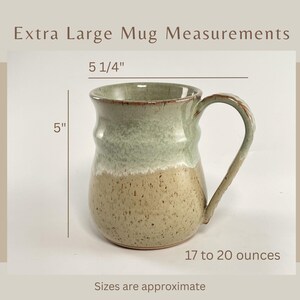 Titled Extra Large Mug Measurements, showing an Extra Large Seafoam Green Banded Belly Mug with measurements 5 1/4" across the handle, 5" high, and 17 to 20 ounces of capacity. Sizes are approximate.