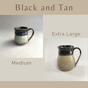 Showing two Black and Tan Banded Belly Mugs, one sized Medium and the other sized Extra Large