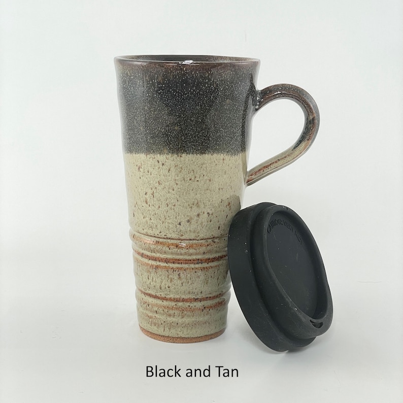 A Black and Tan Travel Mug with Lid