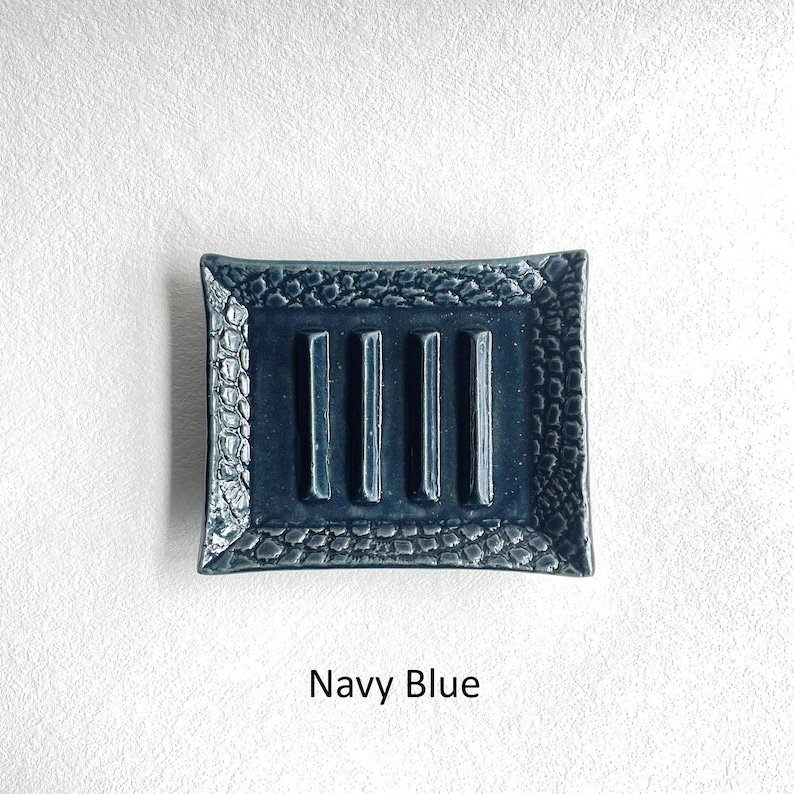A Navy Blue Soap Dish.