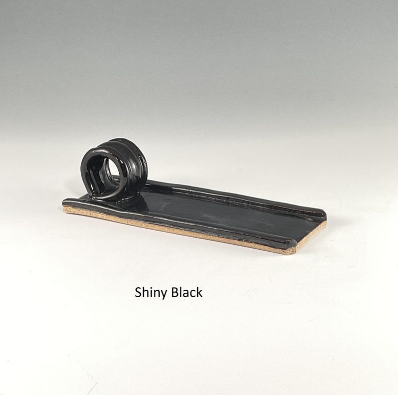 May include: A rustic wooden sign with the text "Welcome to our home" in a handwritten style. The sign has a distressed finish and a simple, inviting design, suitable for a front porch or entryway.