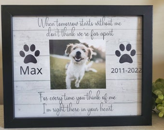 May include: Black framed photo memorial with a white background and a picture of a dog. The text reads "When tomorrow starts without me don't think we're far apart" and "For every time you think of me I'm right there in your heart". The dog's name is Max and the dates are 2011-2022.