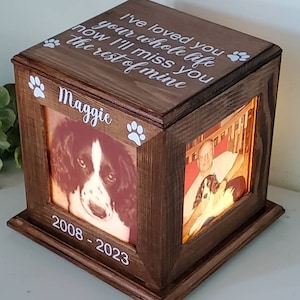 May include: A wooden box with a photo of a dog and a person inside. The box has a light inside and the text "I've loved you your whole life now I'll miss you the rest of mine" and "Maggie 2008-2023" on the front.
