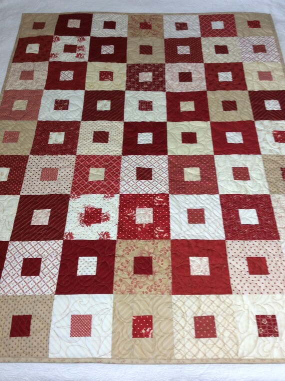 red and tan quilts
