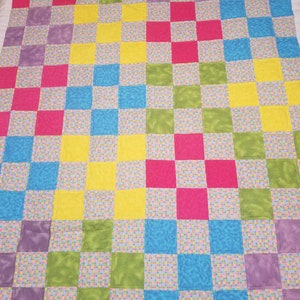 Handmade Flannel Baby Quilt: Colorful Patchwork Crib Blanket