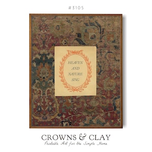May include: A framed print with a vintage rug design in shades of red, blue, and beige. The print features a central cream-colored rectangle with the words "HEAVEN AND NATURE SING" in an orange wreath. The frame is a dark brown.