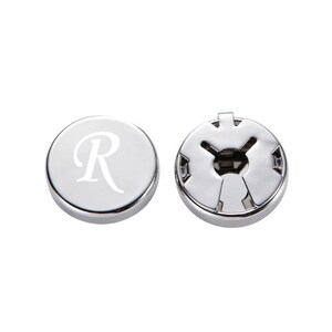 May include: A pair of silver-toned shirt buttons. One button features the letter "R" engraved on the front. The other button is the back piece that attaches to the shirt.