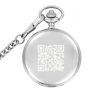 May include: A silver pocket watch with a chain. The watch face has a white QR code engraved on it.