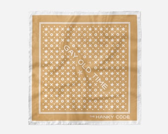 May include: A tan bandana with a white pattern of stars and circles. The text "A Gay Old Time" is printed in white in the center of the bandana. The text "The Hanky Code" is printed in white at the bottom of the bandana.