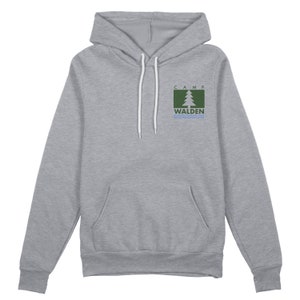 May include: A grey hooded sweatshirt with a front pocket and white drawstring. The sweatshirt features a small graphic on the chest that reads "CAMP WALDEN" with a tree and water design.