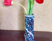 Swirling mosaic flower vase in iridescent purple and blue stained glass