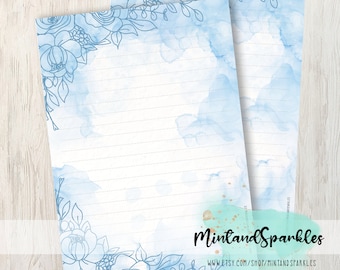 Hojas de papel para escribir cartas con flores de acuarela azul