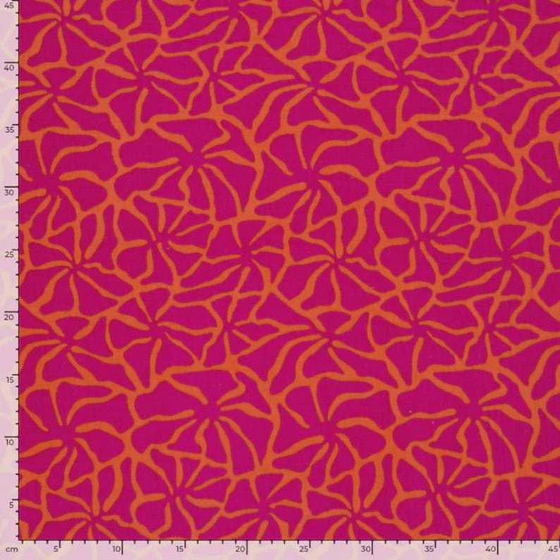 May include: A vibrant fabric featuring a repeating pattern of stylized orange floral shapes against a bright magenta background. The design has a modern, abstract feel, suitable for various craft projects.