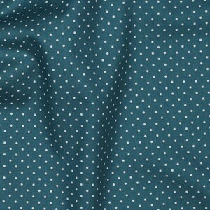Op de afbeelding: Teal stof met een wit stippenpatroon.