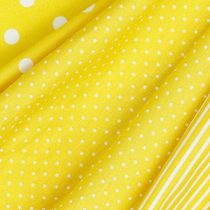 Puntos de algodón amarillo/blanco