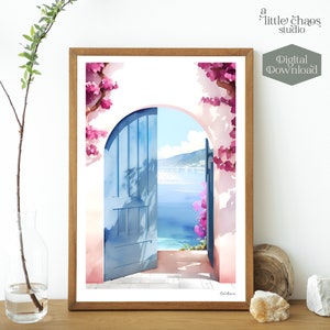 K&ouml;nnte beinhalten: Aquarelldruck einer blauen T&uuml;r, die sich zu einer Meereslandschaft &ouml;ffnet, gerahmt in einem Holzrahmen. Rosa Bl&uuml;ten schm&uuml;cken den Bogen. Die Worte "a little chaos studio" und "Digital Download" sind sichtbar.