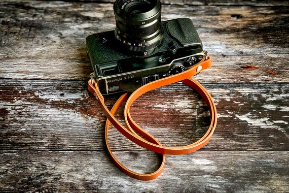 tan camera strap