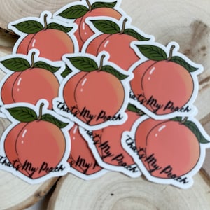 May include: A set of peach-colored stickers with a peach design and the text "That's My Peach".