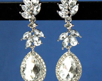 Pendientes colgantes de cristal para novias: Joyería llamativa con diamantes de imitación plateados, hechos a mano.