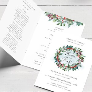 May include: A wedding ceremony order of service with a watercolour wreath design featuring holly and berries. The text reads "Order of Service for the Marriage of Emelia and Niall" and includes the date and location of the ceremony: Church of St Etheldreda, West Quantoxhead, Saturday 24th December 20XX, 2 o'clock in the afternoon. The service is conducted by the Reverend Michael Williams.